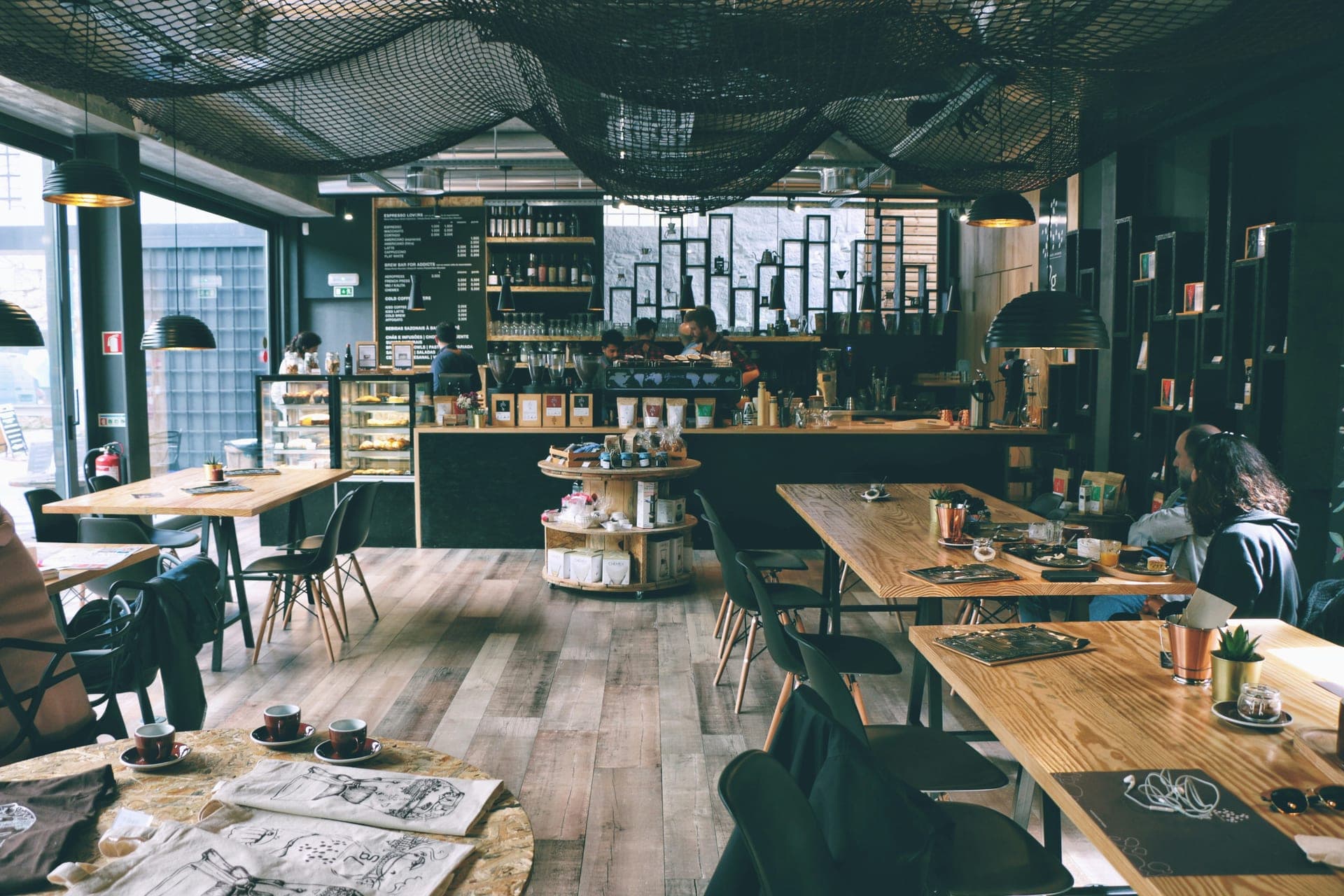 Wide view of the café with guests and counter