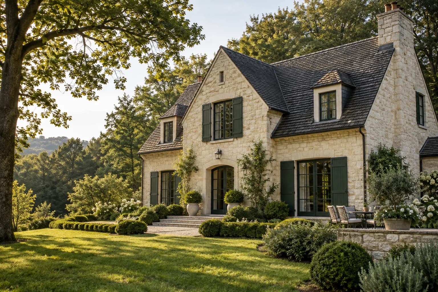 forest-edge detached house exterior, cream stone, steep roof and deep green shutters